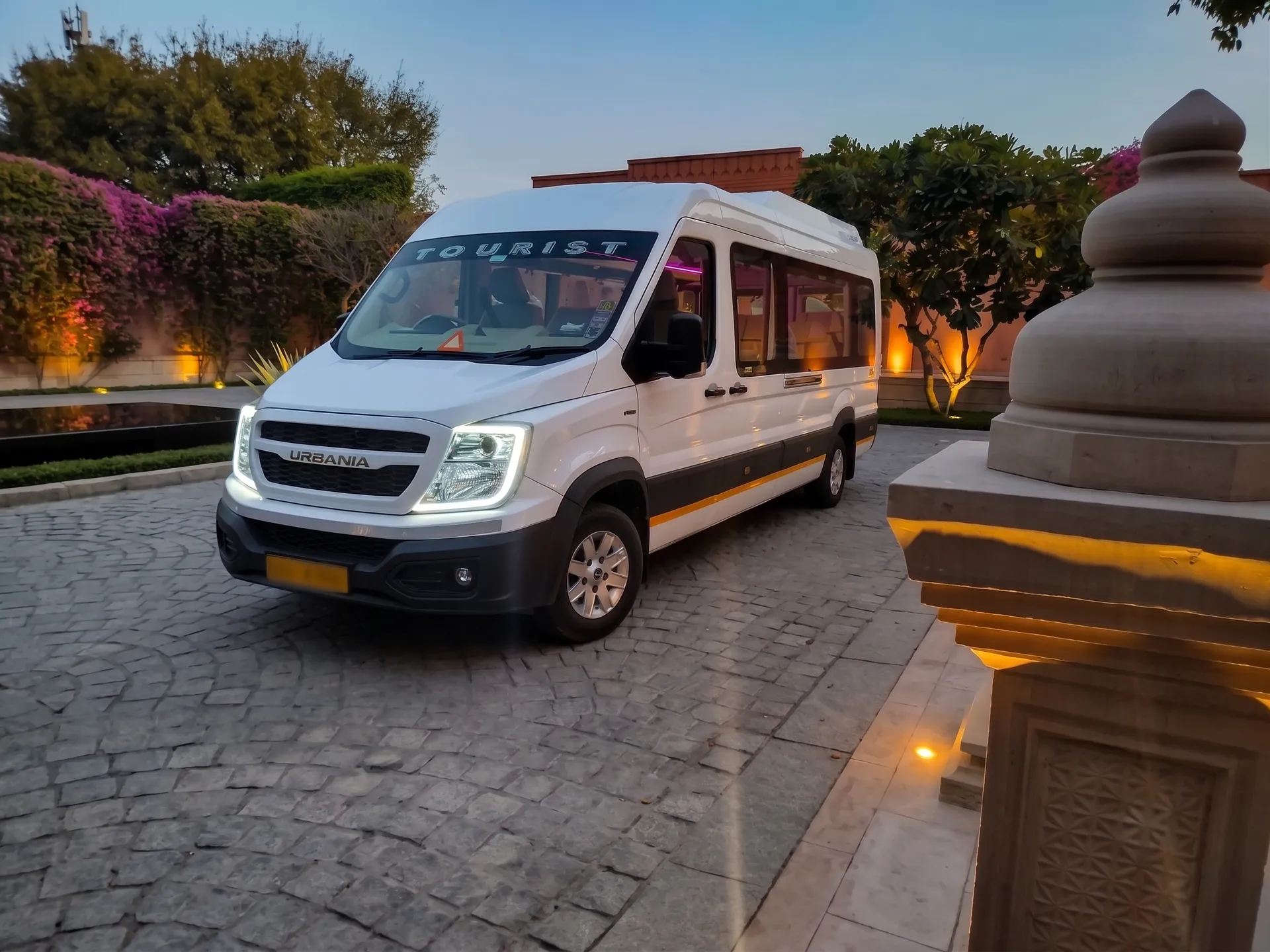 Exterior view of the majestic Maharaja Urbania parked in front of elite terminal space